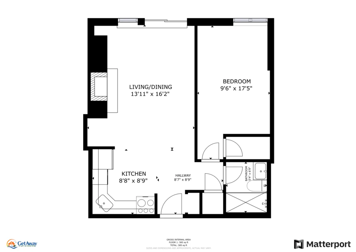 This image captures a cozy and functional interior space featuring a living and dining area, kitchen, and a glimpse of a bedroom. The space is designed for shared meals, relaxed movie nights, and morning coffee rituals, emphasizing comfort and togetherness.